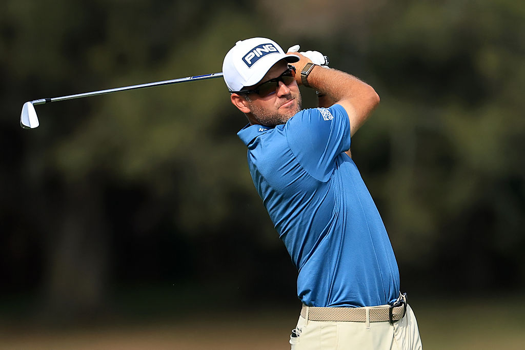PONTE VEDRA BEACH, FLORIDA - MARCH 15: Corey Conners of Canada hits his second shot on the 14th hole during the final round of THE PLAYERS Championship 2026 at THE PLAYERS Stadium course at TPC Sawgrass on March 15, 2026 in Ponte Vedra Beach, Florida.