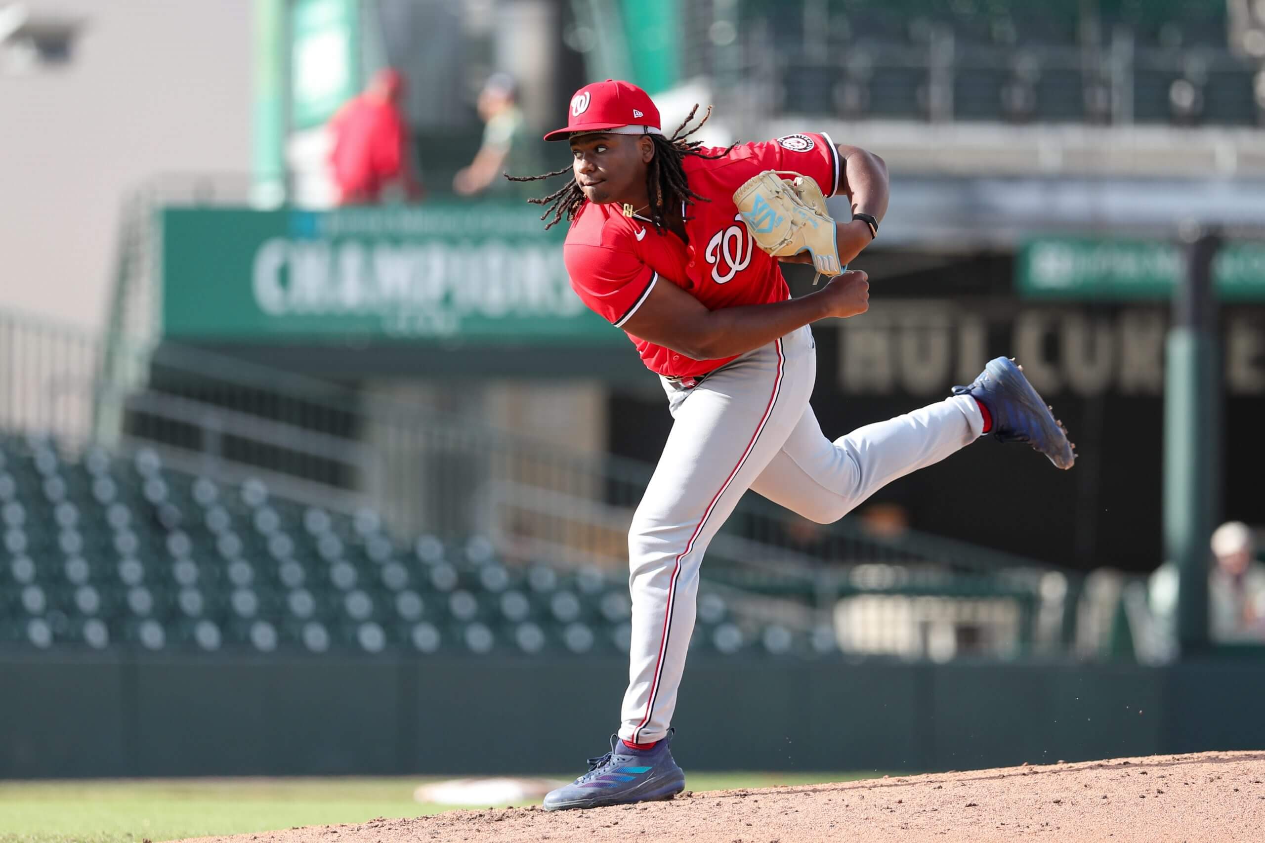 Miguel Sime Jr. of the Washington Nationals follows through on a pitch.