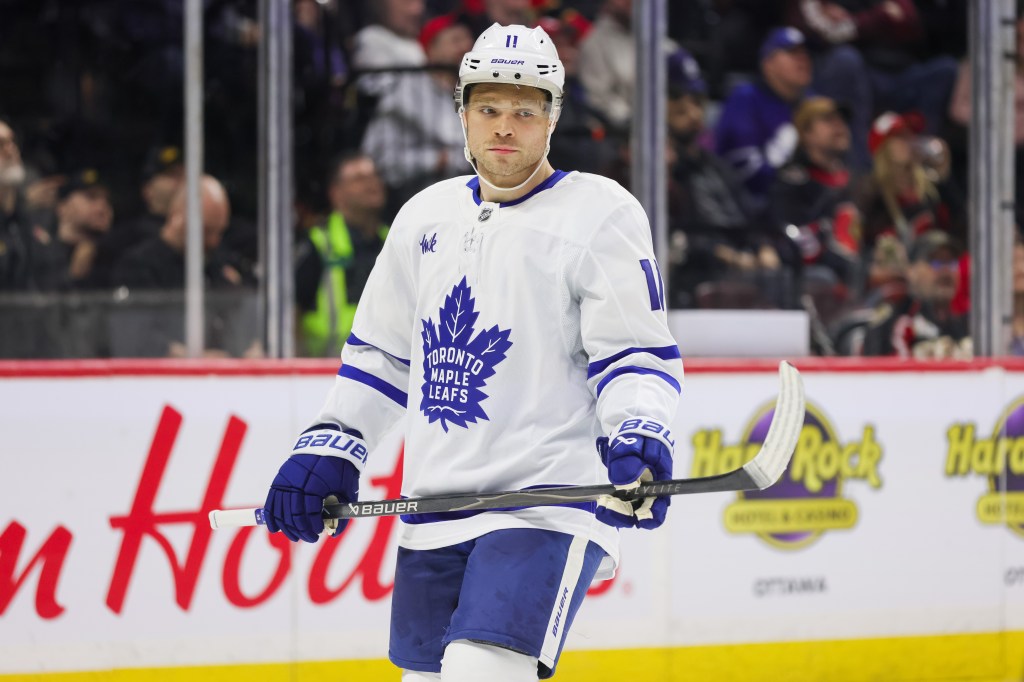 Maple Leafs player Max Domi on the ice during a game against the Senators.