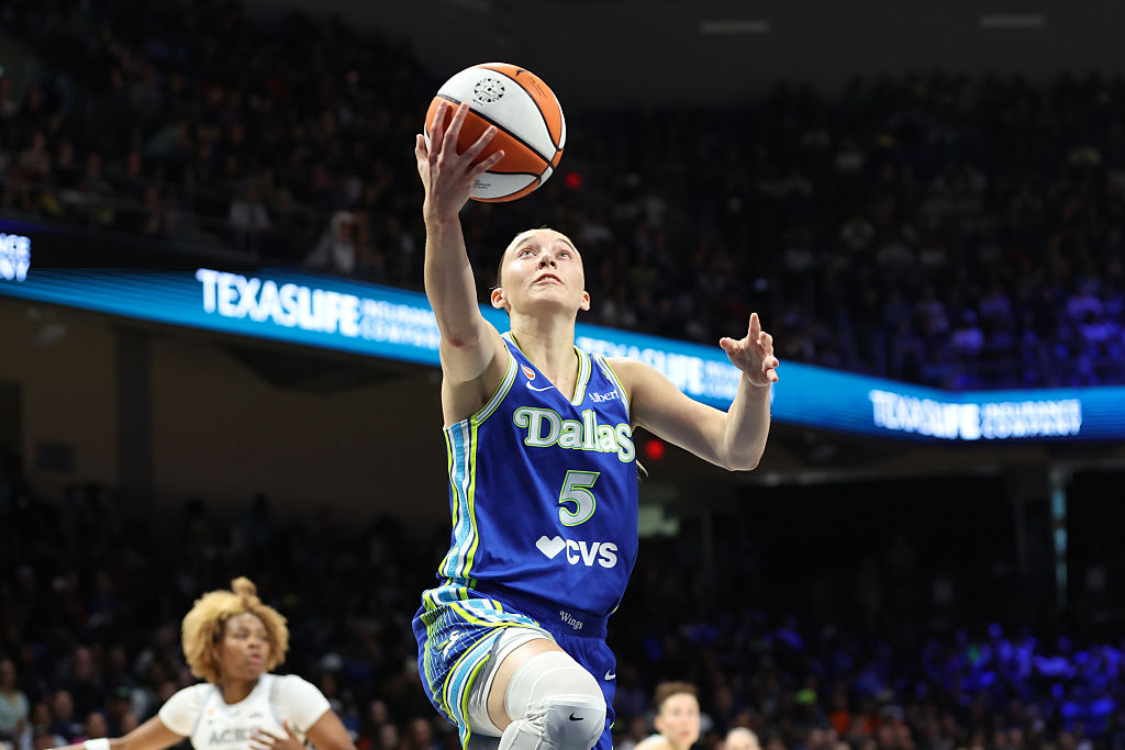 ARLINGTON, TX - MAY 28: Paige Bueckers #5 of the Dallas Wings drives to the basket during the game against the Las Vegas Aces on May 28, 2026 at the College Park Center in Arlington, TX.