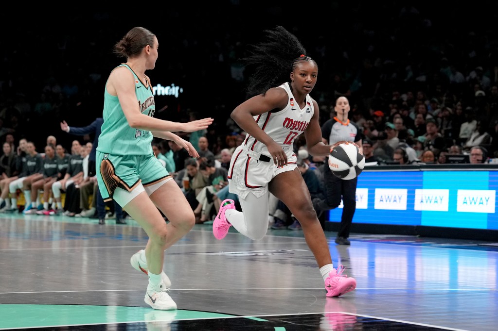 Michaela Onyenwere of the Washington Mystics drives to the basket during the game against the New York Liberty during the WNBA Commissioner's Cup on June 14, 2026 at Barclays Center Arena in Brooklyn, New York. 
