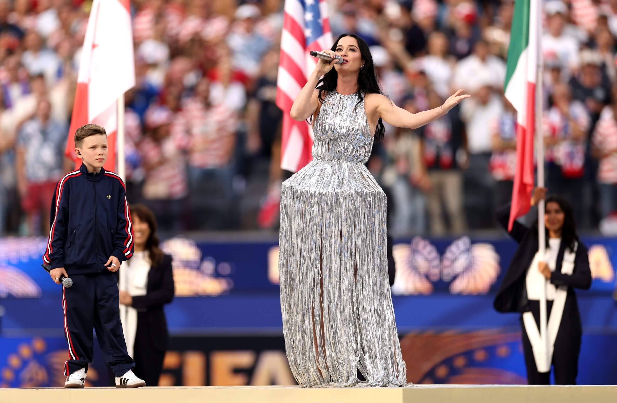 Katy Perry performs with Tius Luka before the U.S.'s World Cup game against Paraguay on Friday.