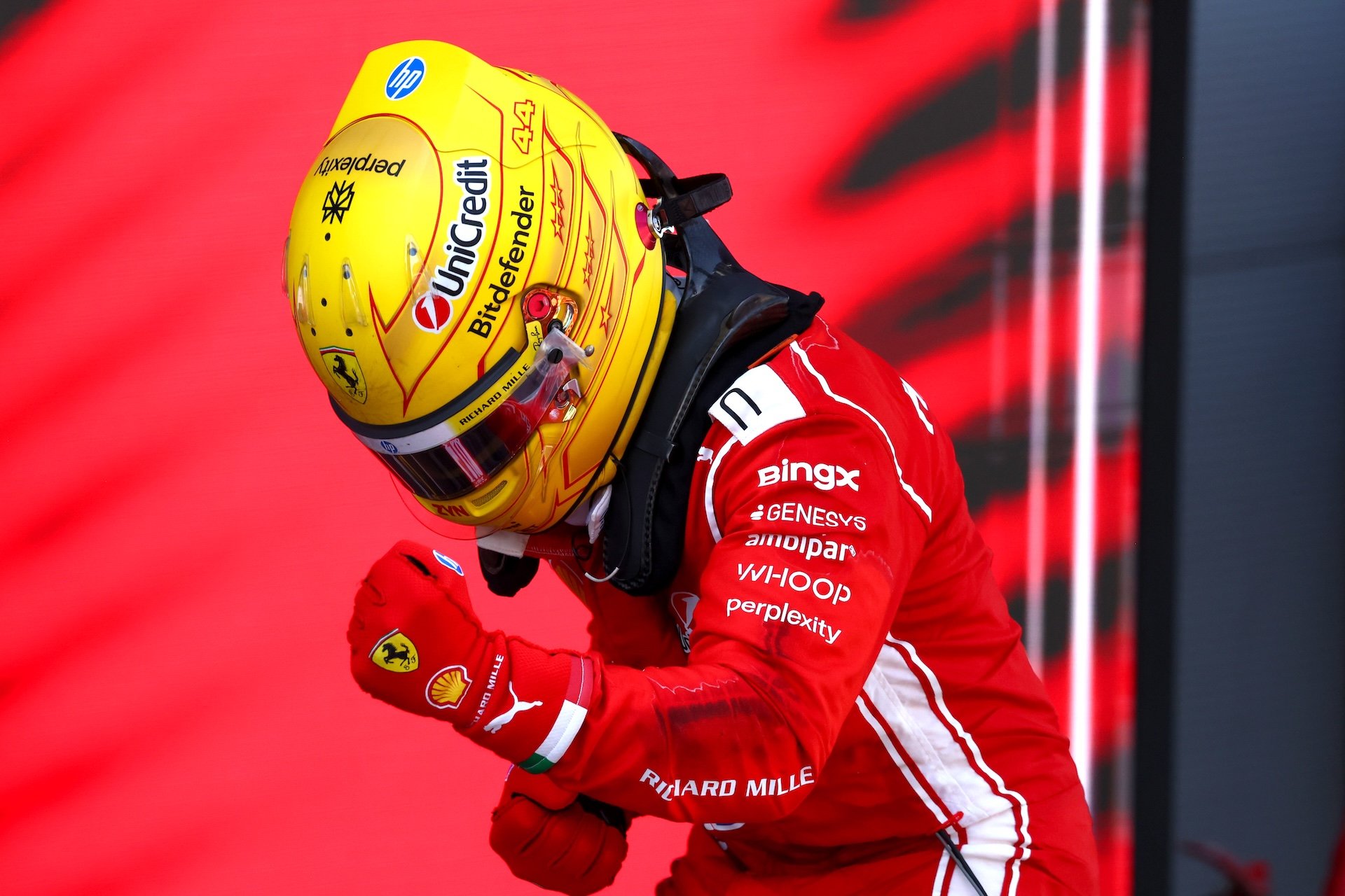 BARCELONA, SPAIN - JUNE 14: Race winner Lewis Hamilton of Great Britain and Scuderia Ferrari celebrates on arrival in parc ferme during the F1 Grand Prix of Barcelona-Catalunya at Circuit de Barcelona-Catalunya on June 14, 2026 in Barcelona, Spain. (Photo by Clive Rose/Getty Images)