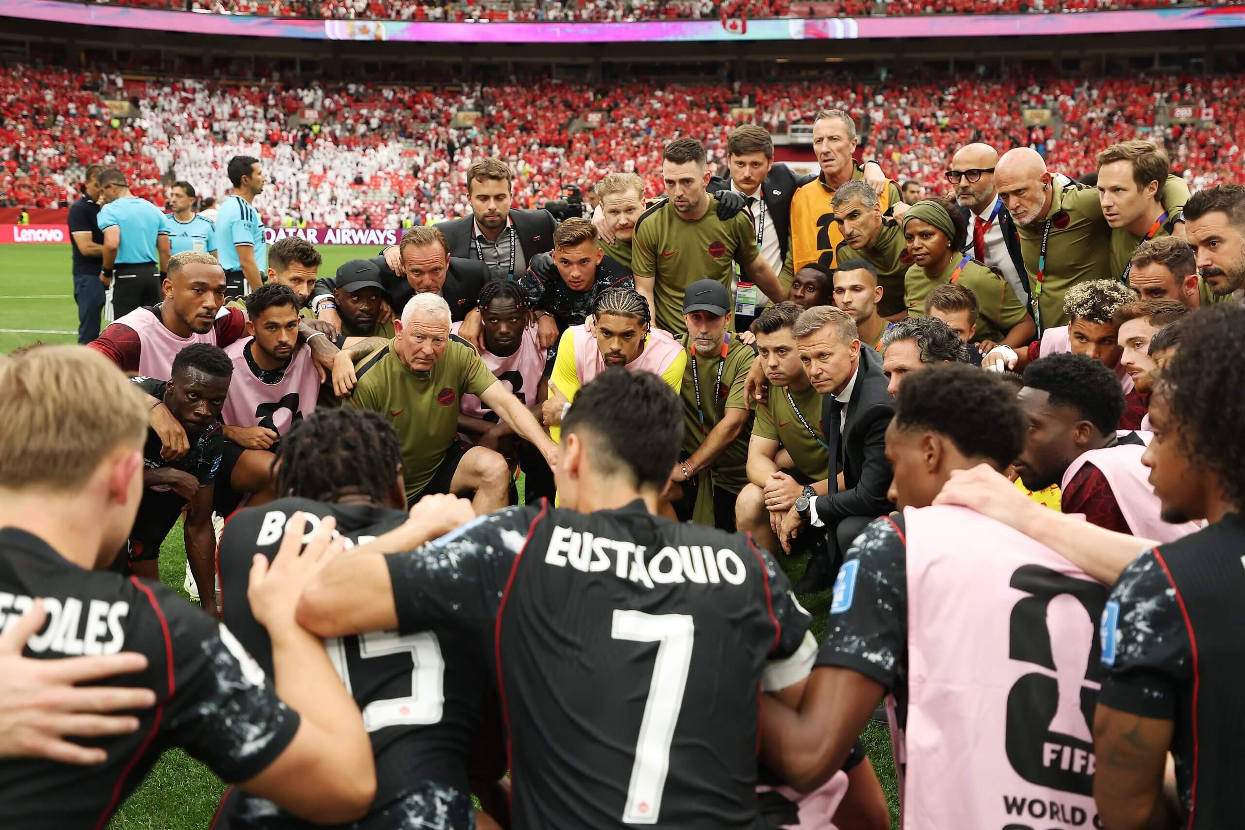 Canada players huddle after a game