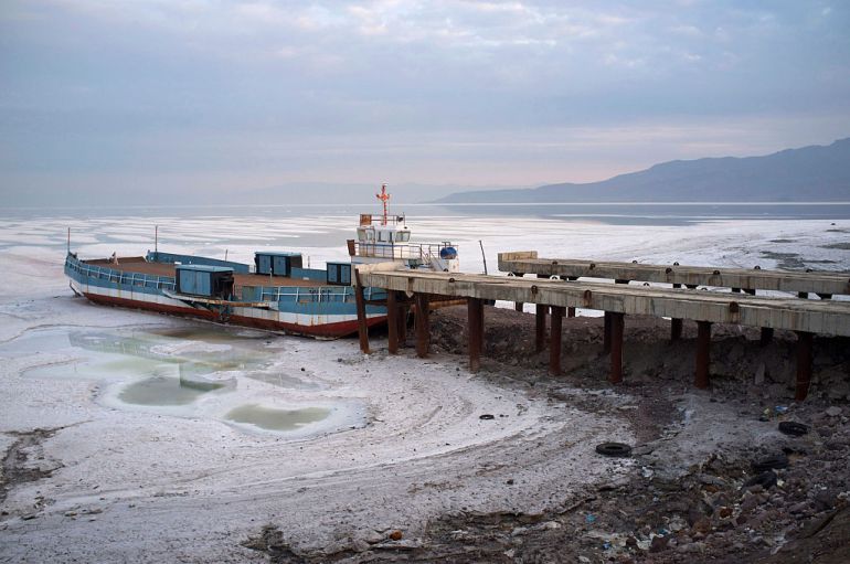 URMIA, IRAN - OCTOBER 11, 2014: A genral view of the Urmia Lake which has ran out of water due to ecological catastrophe on October 11, 2014 in Urmia, Iran. Lake Urmia is a salt lake in northwestern Iran near Iran's border with Turkey. The lake is between the provinces of East Azerbaijan and West Azerbaijan in Iran, and west of the southern portion of the Caspian Sea. At its full size, it is the largest lake in the Middle East and the sixth largest saltwater lake on earth with a surface area of approximately 5,200 kmÂ² (2,000 mileÂ²), 140 km (87 mi) length, 55 km (34 mi) width, and 16 m (52 ft) depth. Lake Urmia along with its approximately 102 islands are protected as a national park by the Iranian Department of Environment. (Photo by Kaveh Kazemi/Getty Images)