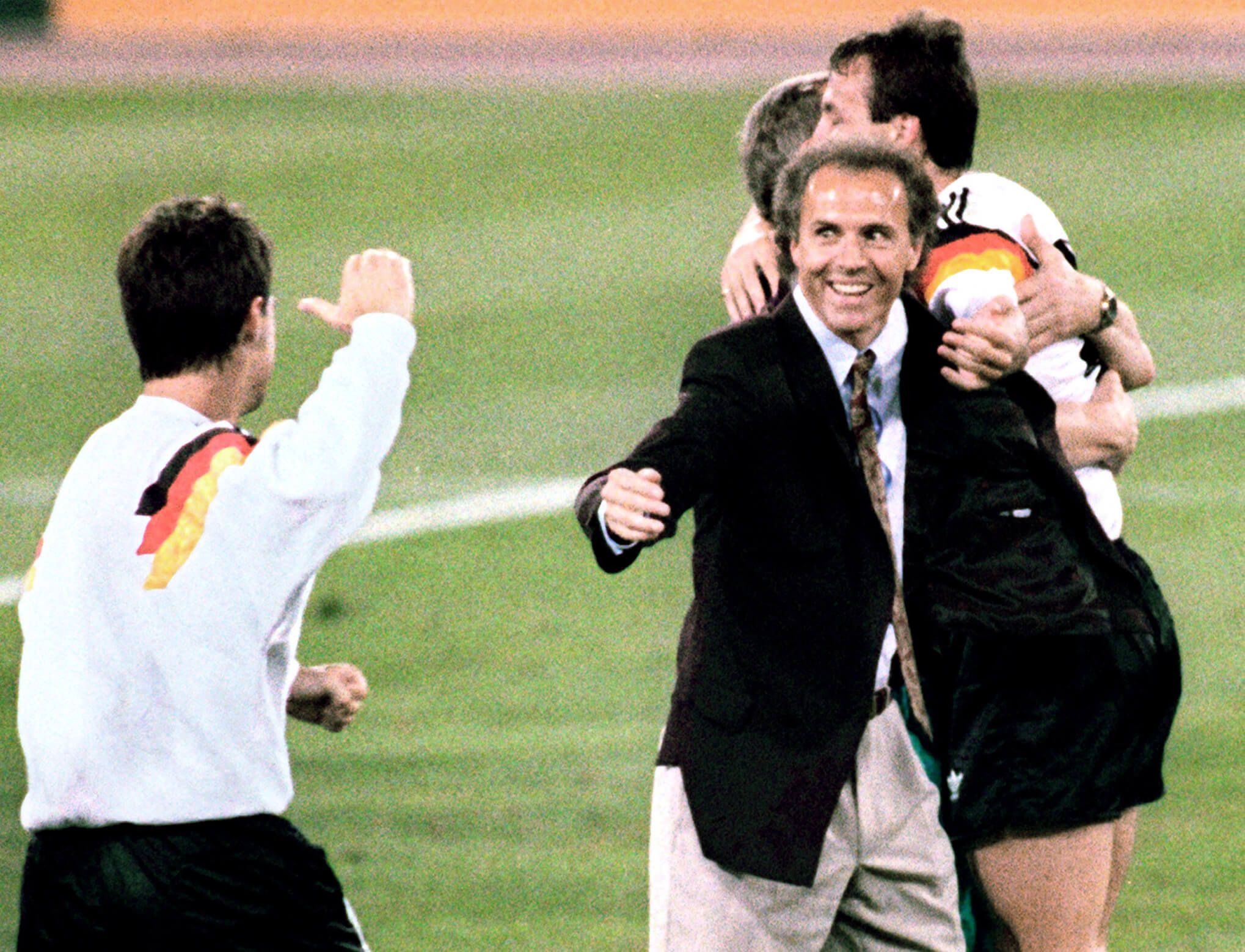 Franz Beckenbauer celebrates West Germany's success in the 1990 World Cup final