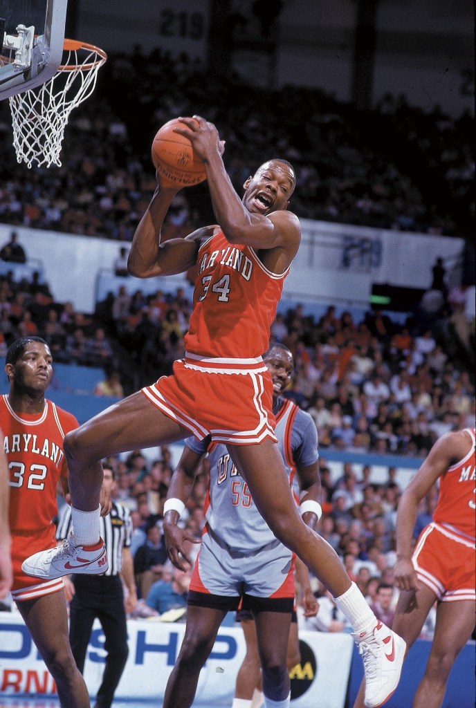 Len Bias goes up high to grab a rebound