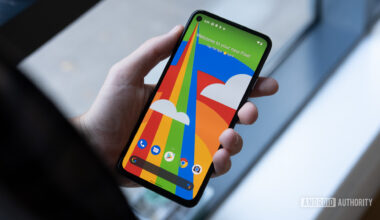Google Pixel 4a 5G in hand front of phone 2
