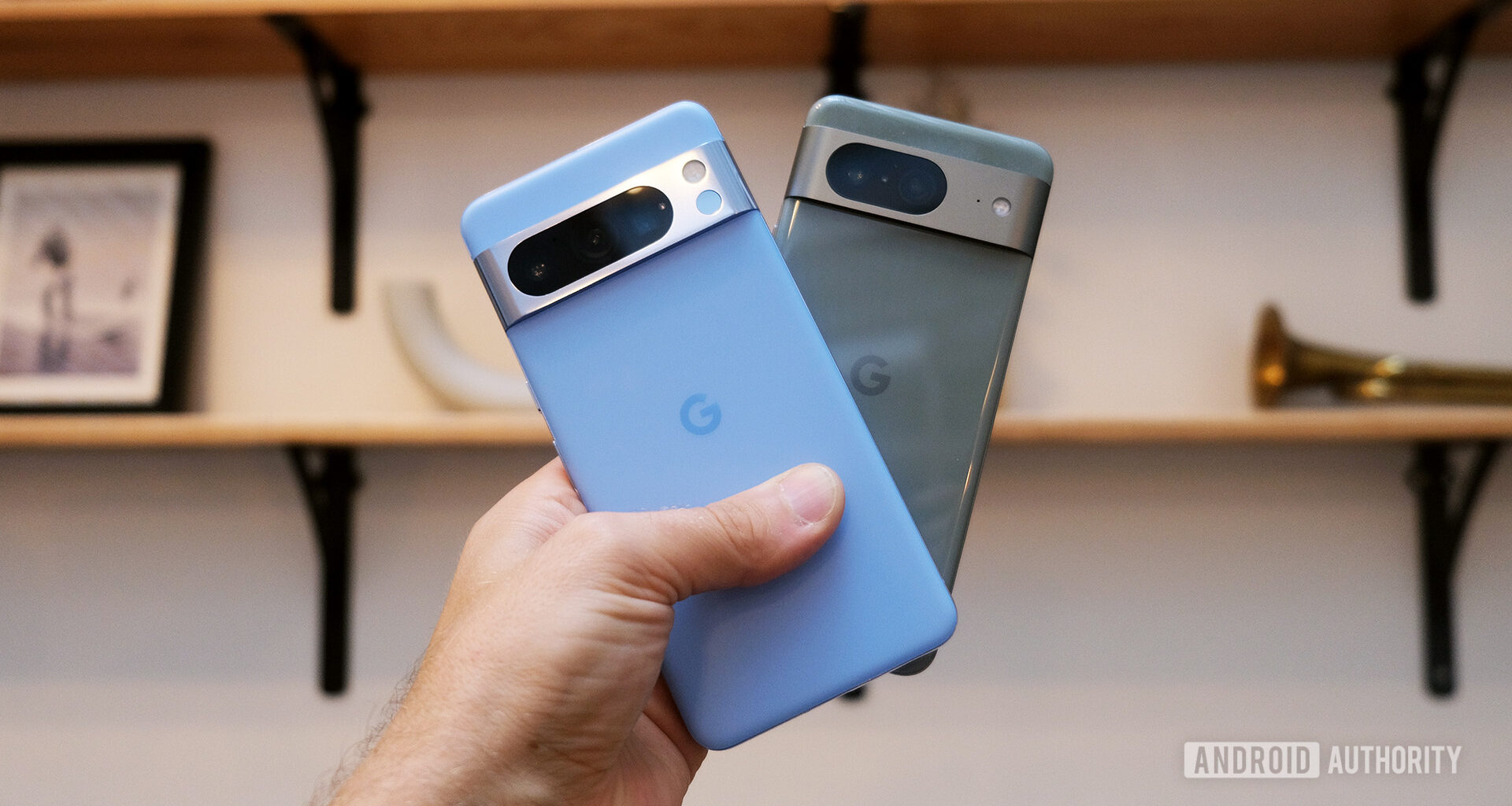 Google Pixel 8 Pro and Pixel 8 held in hand