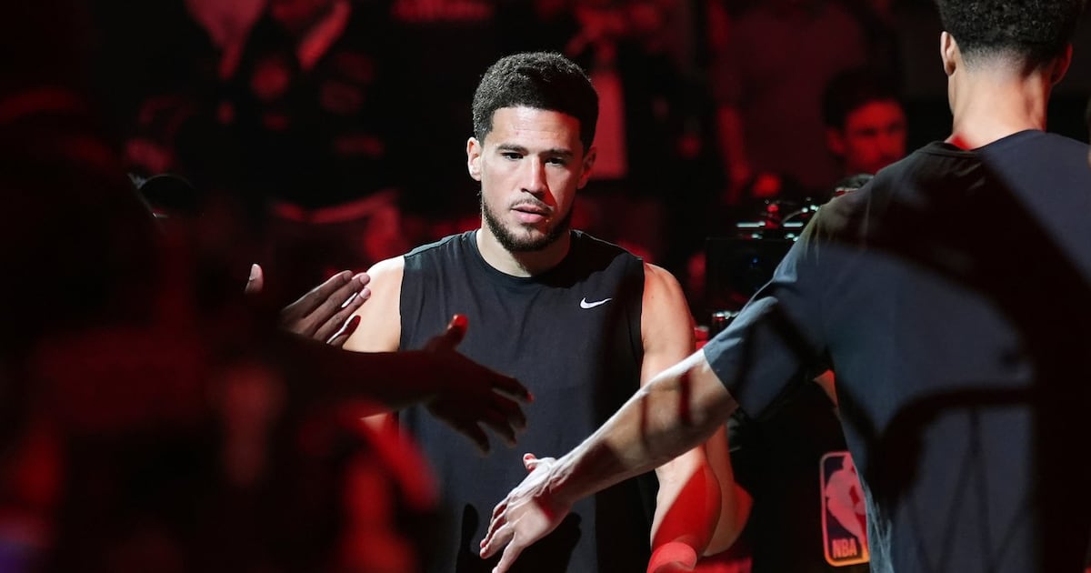 Phoenix Suns' All-Star guard Devin Booker changes jersey number to No. 15 in honor of his dad Melvin