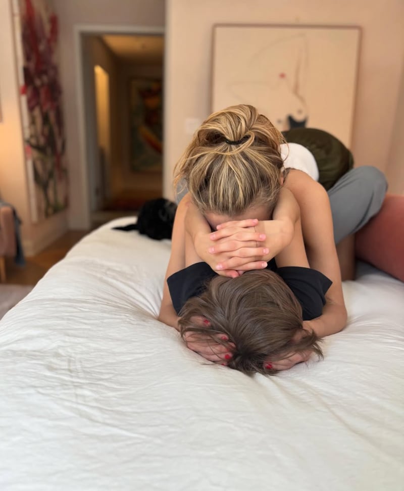 Some commenters were disturbed by the picture Jenny Mollen posted, in which she was face-to-face with her pre-teen son while lying on a bed.