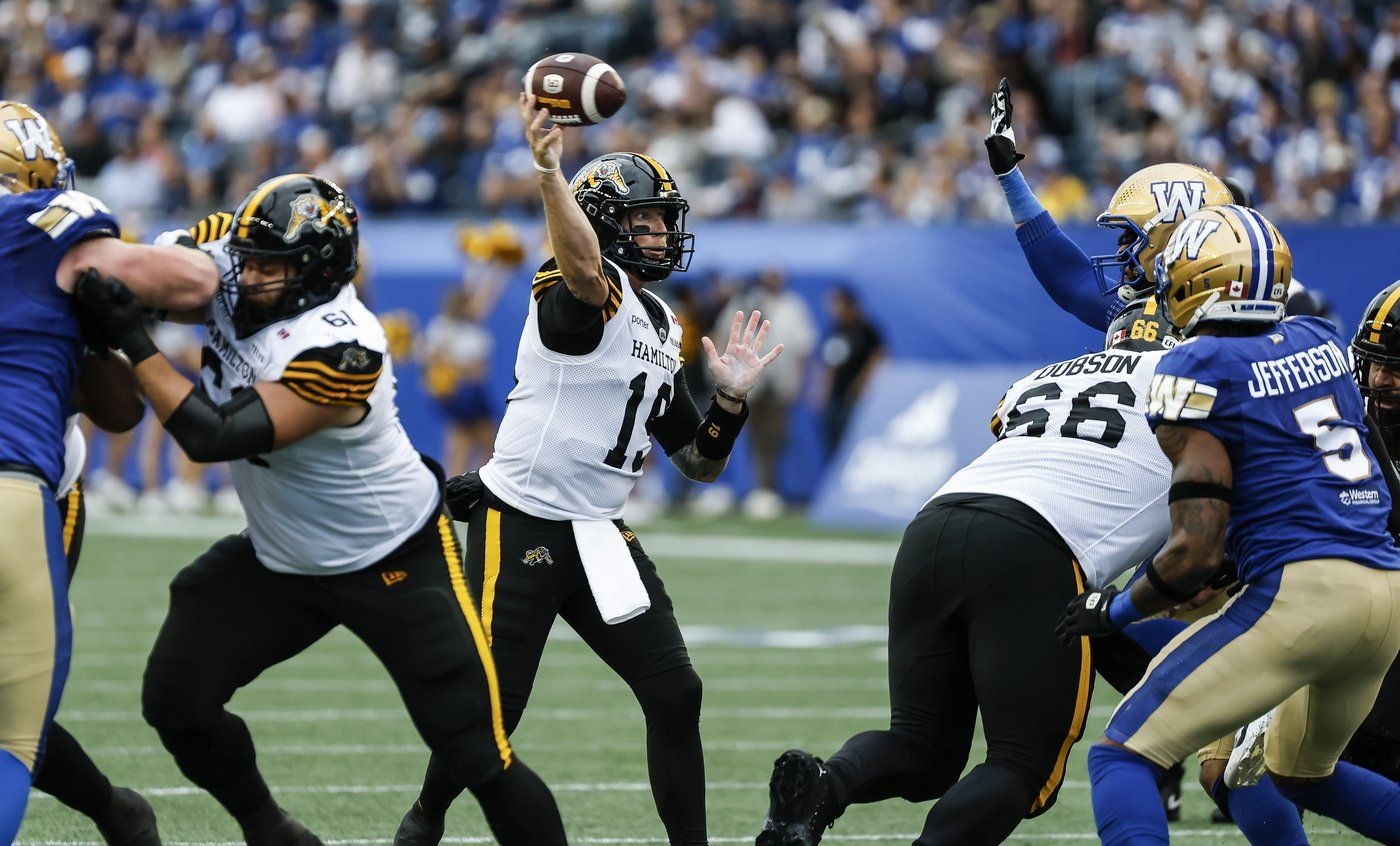 Mitchell tosses three TDs in Ticats' 37-27 win over Blue Bombers