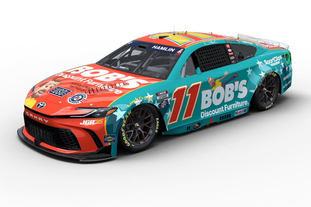 Race car #11 in bright teal and orange livery with Bob's Discount Furniture sponsorship, shown from a front-side angle
