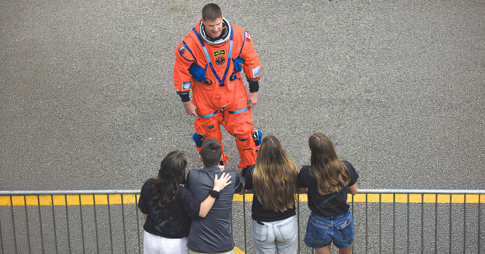 Hansen family, including Dr. Catherine Hansen and her three children with astronaut Jeremy Hansen before the Artemis II test flight.