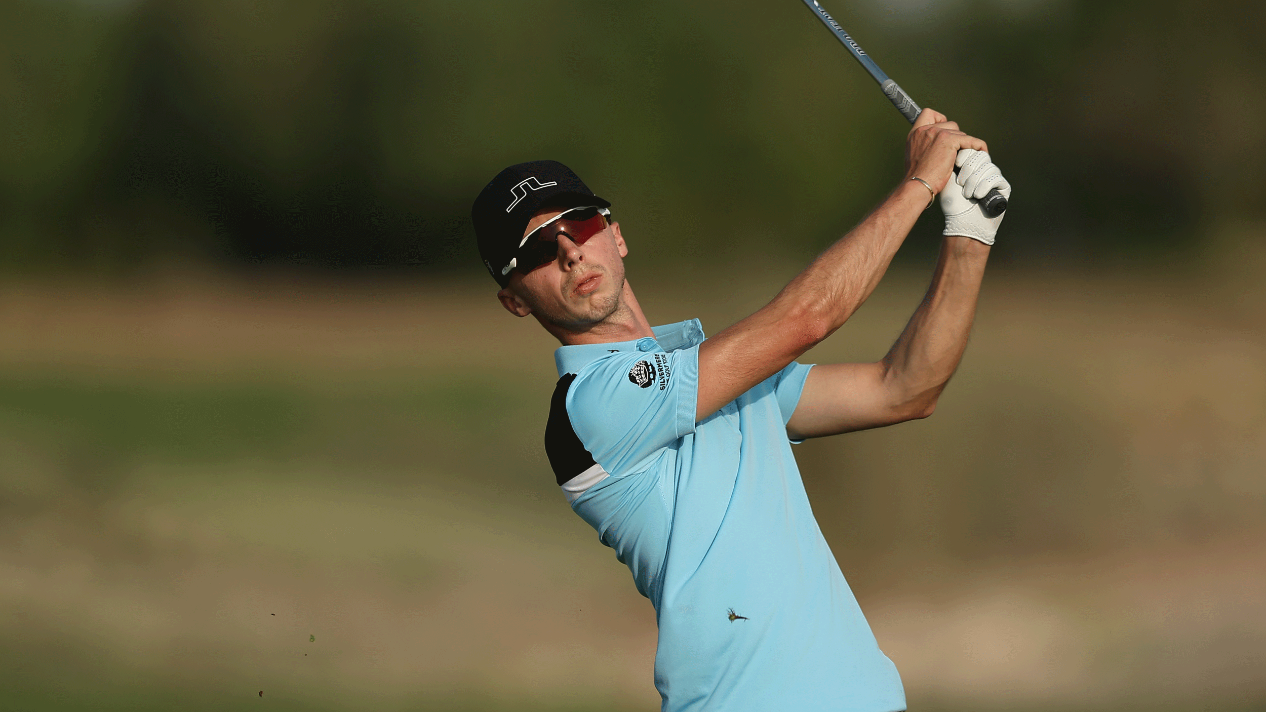 Piers Berrington hits a shot during a Clutch Tour event in 2026