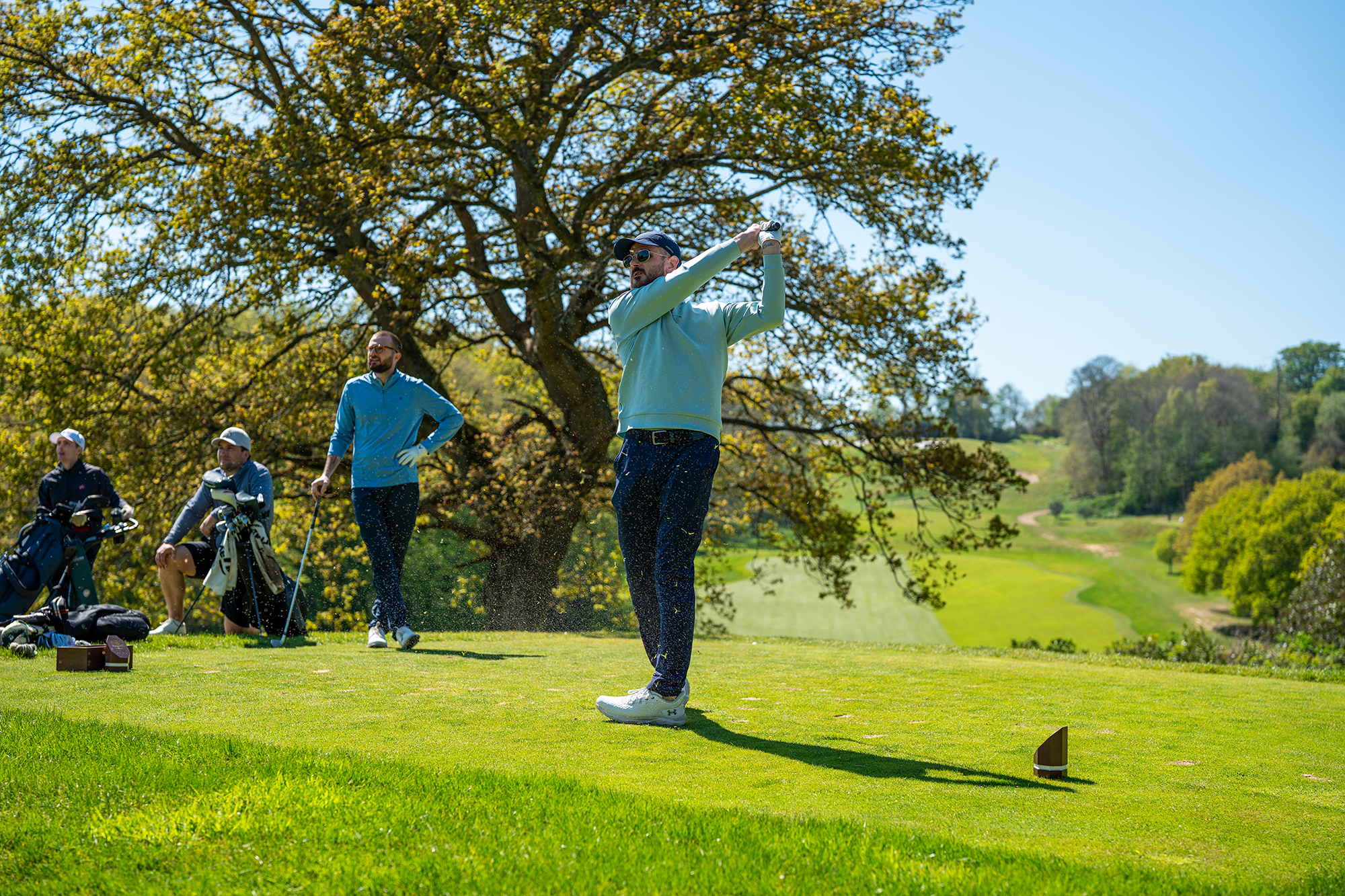 Baz Plummer hitting a tee shot on the 15th hole at Tandridge Golf Club with a Benross RS300 7-iron