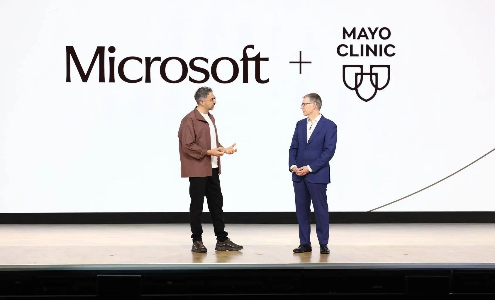 Mustafa Suleyman, CEO of Microsoft AI, and Gianrico Farrugia, M.D., president and CEO, Mayo Clinic
