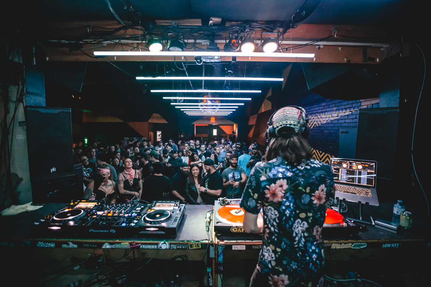 A DJ plays for a group of people