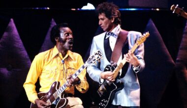 Photo of Chuck BERRY and Keith RICHARDS; Chuck Berry and Keith Richards performing on stage at Chuck's 60th Birthday Concert for the filming of "Hail Hail Rock &amp; Roll"