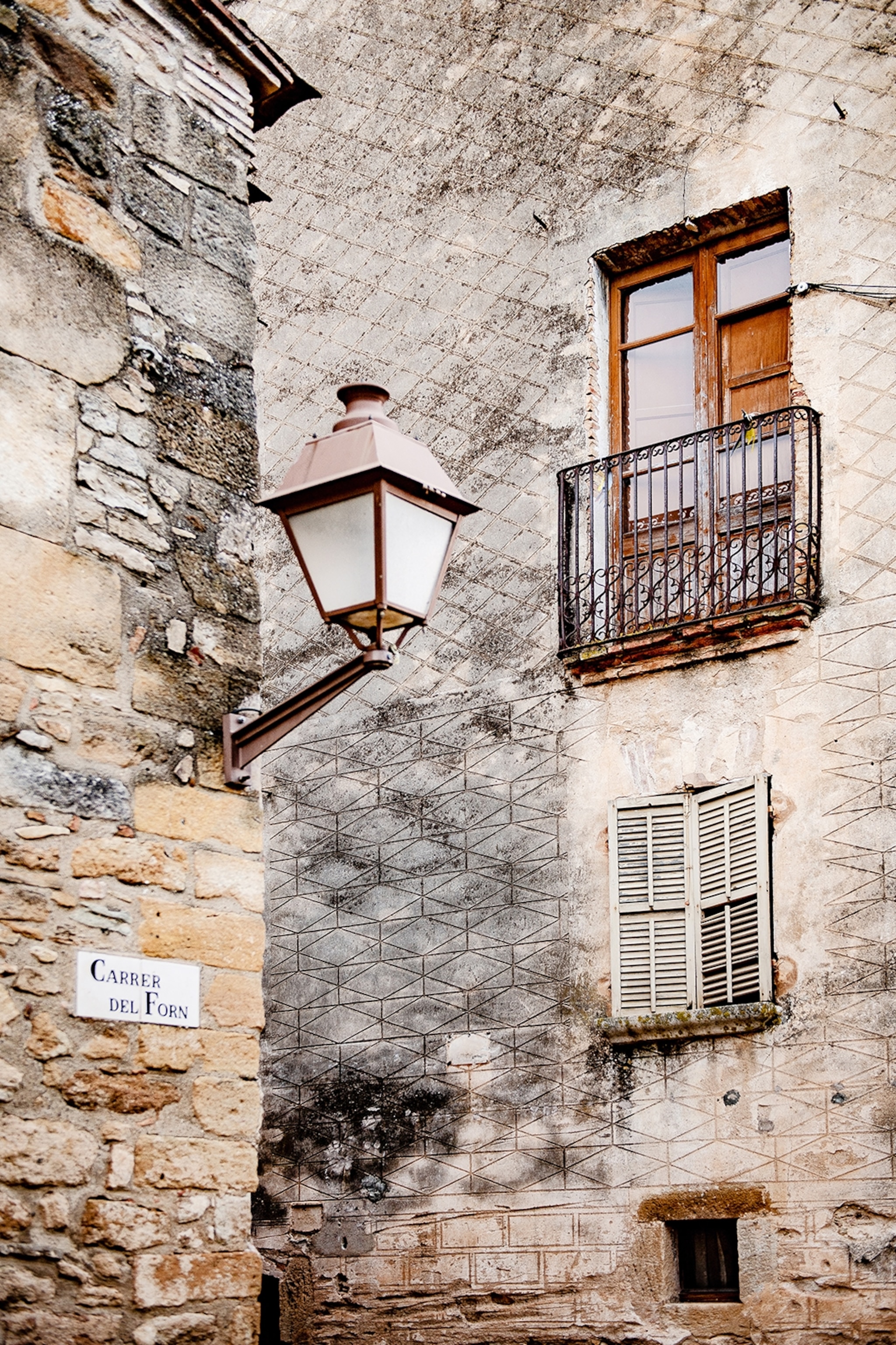 Close-up of a streetlamp on a corner.