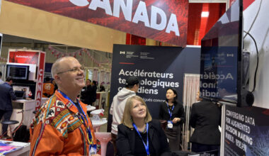Dean and Myrna at a Canada booth