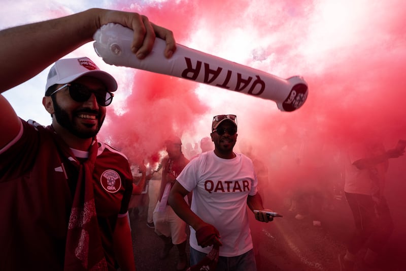 Qatar fans march