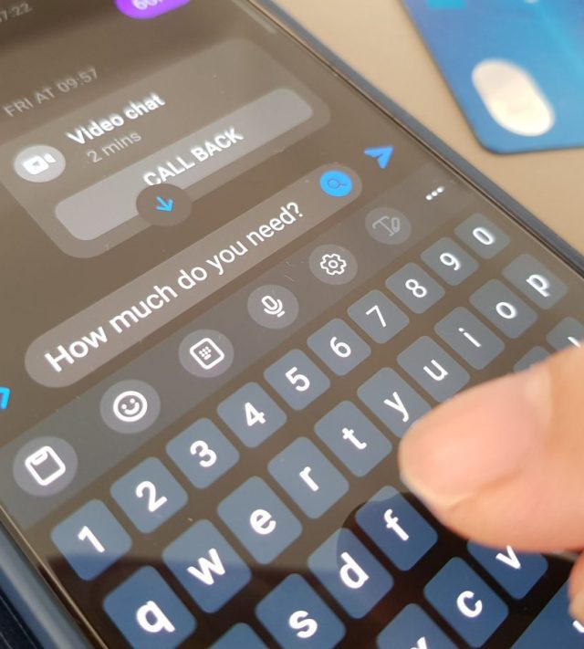 A person texting the words 
