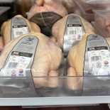 NORTHWICH, ENGLAND - JULY 06: Whole chicken sit on display in a Tesco supermarket on July 06, 2022 in Northwich, England. The British Retail Consortium recently said food manufacturers and supermarkets are having to pass on some of the cost of soaring raw materials to consumers, leading to the price of basic goods throughout the UK rising at the fastest pace since September 2008. Fresh food prices increased by 6% in the year to June 2022 coupled with an increase in inflation, and fuel and energy prices to create a cost of living crisis. This is leading to millions of low-income households going without essentials items, falling behind on bills and taking on debt. (Photo by Christopher Furlong/Getty Images)