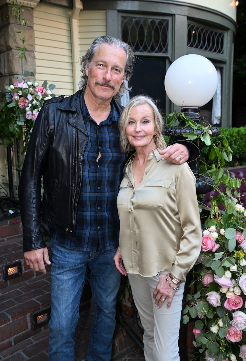 John Corbett and his wife, Bo Derek, are pictured at the Shania Twain rose ceremony in 2026.