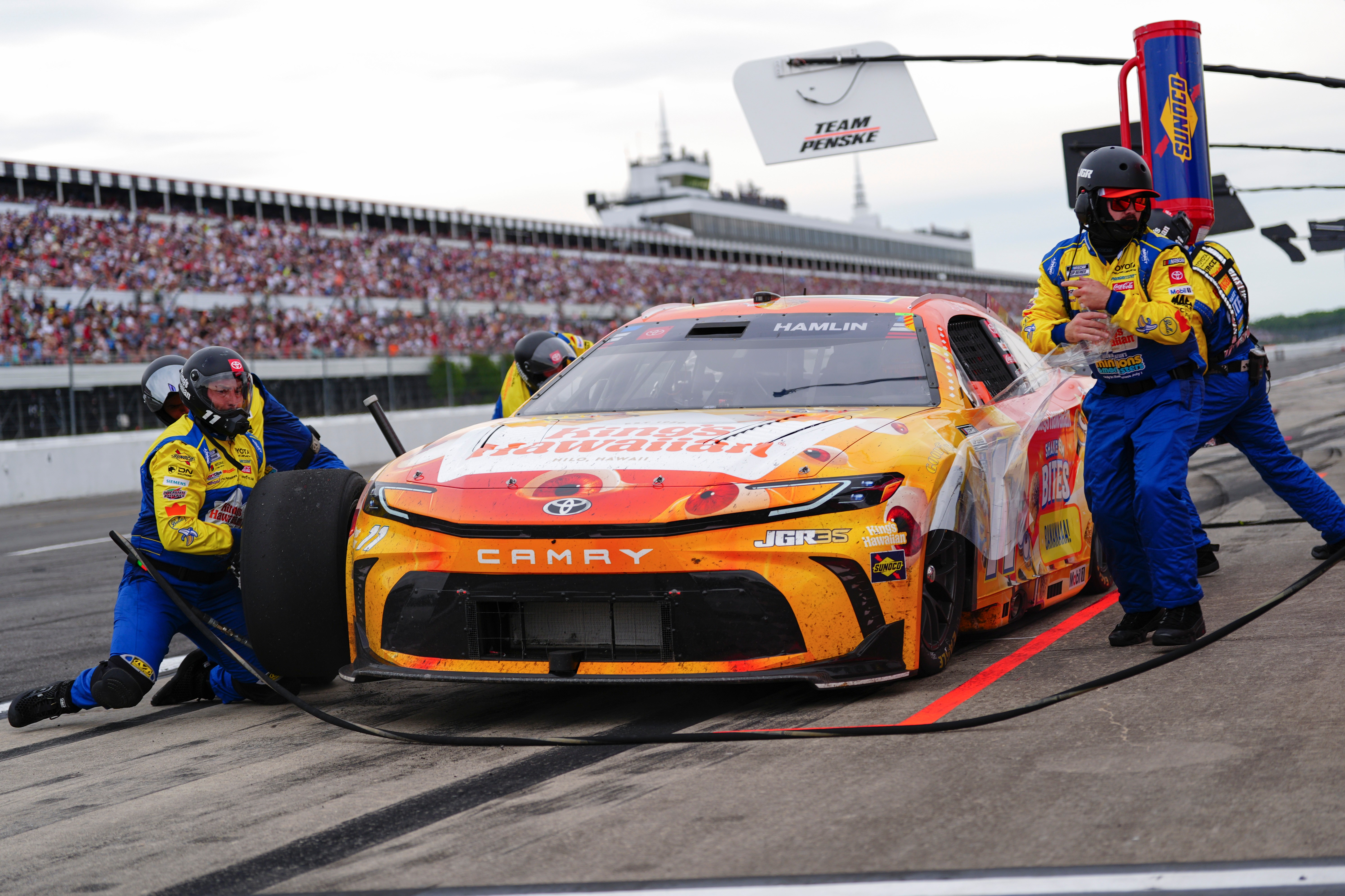 Denny Hamlin makes a pitstop during a NASCAR Cup Series...