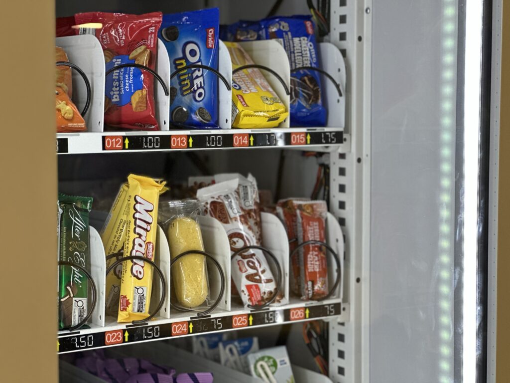 Vending machine with snacks inside.
