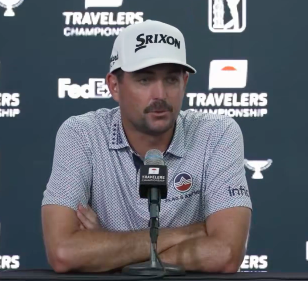 Golfer Max Homa speaking at a press conference.