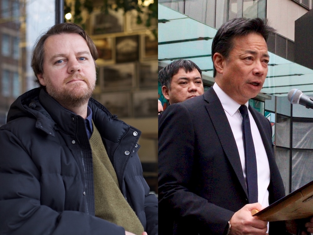 On the left, a middle-aged man with a brown moustache and beard sits at a table outside a coffee shop. On the right, a middle-aged man with short black hair and wearing a suit speaks at a podium.
