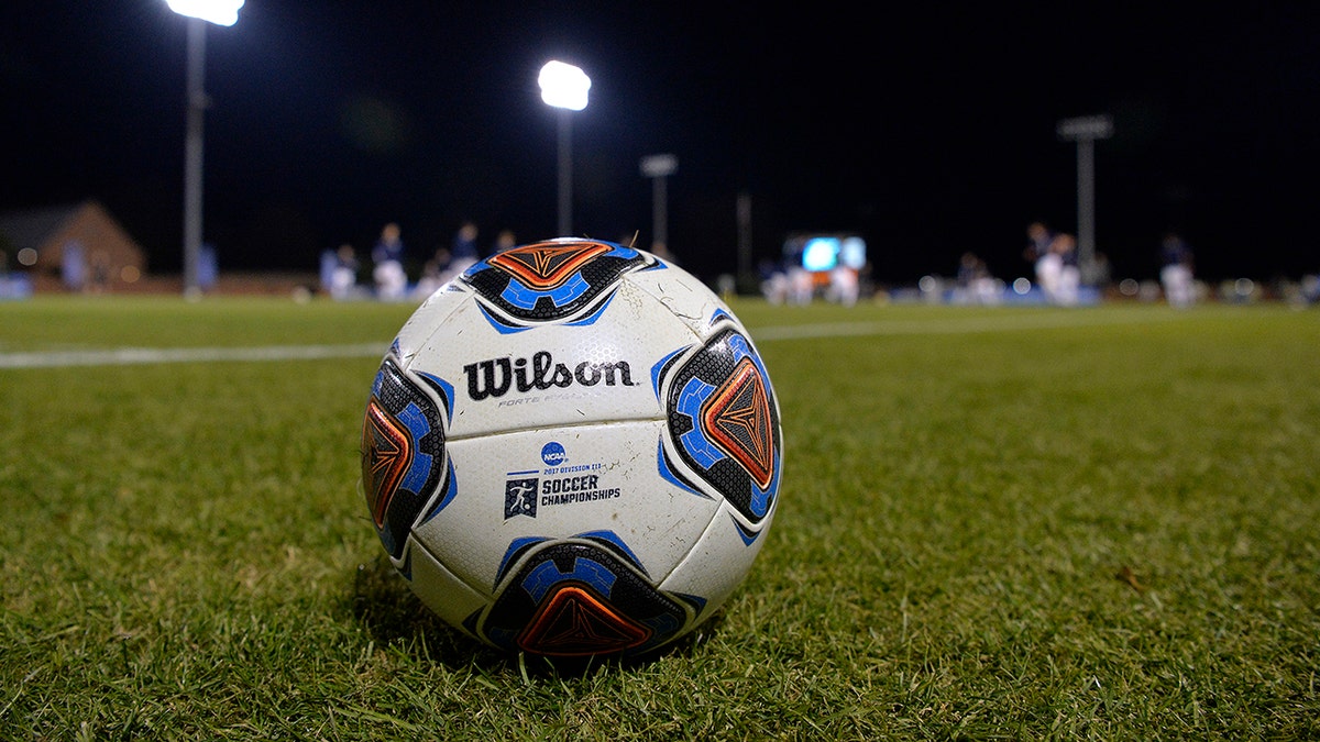 A soccer ball resting on the field at UNC Greensboro Soccer Stadium.