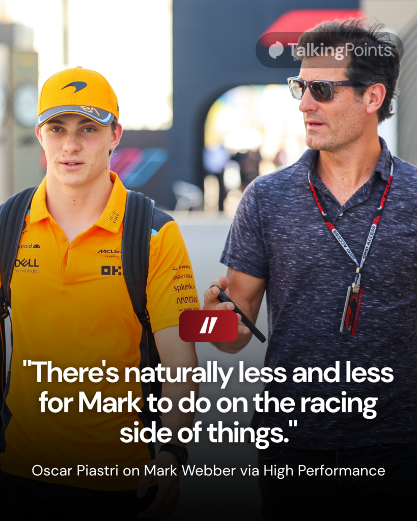 Oscar Piastri of McLaren walks with Mark Webber in the F1 paddock