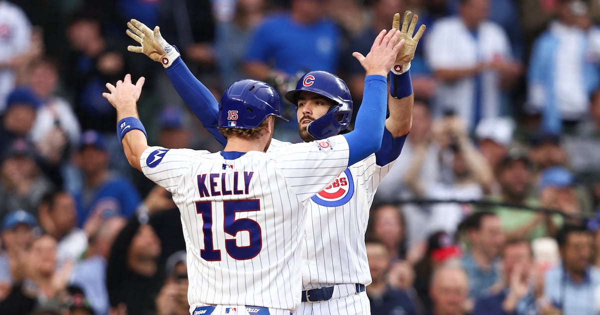 Chicago Cubs score seven runs in second inning as they hold off Colorado Rockies in victory