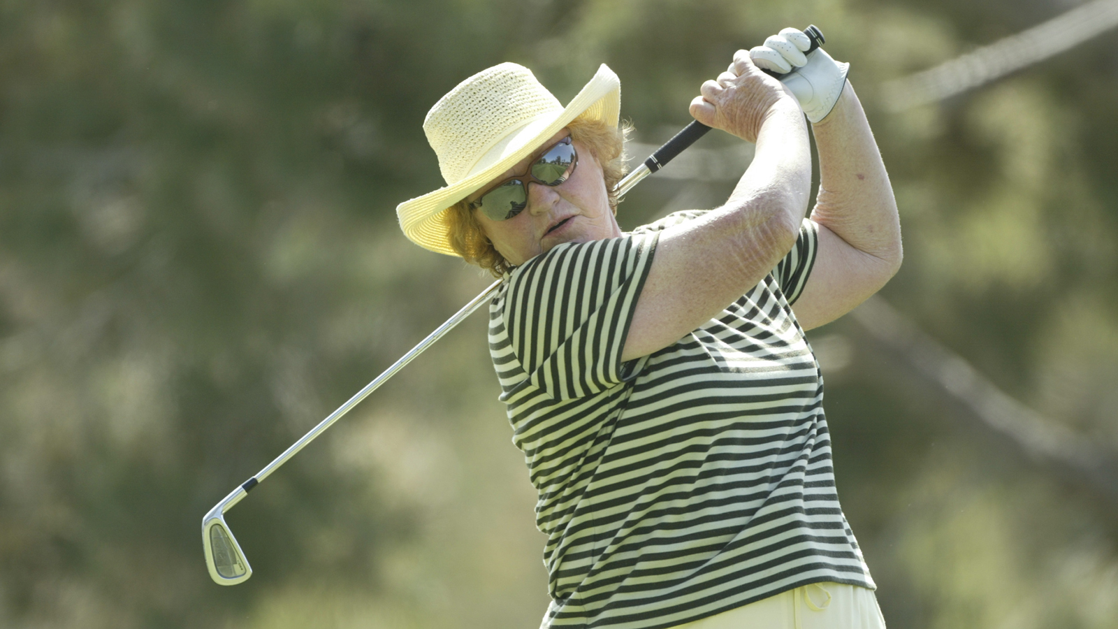 JoAnne Carner hits a shot during the first round of the Kraft Nabisco Championship at the Mission Hills Country Club