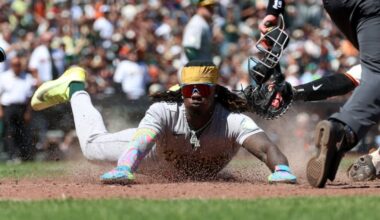 Athletics score four runs with two outs in ninth, rally to beat the Giants