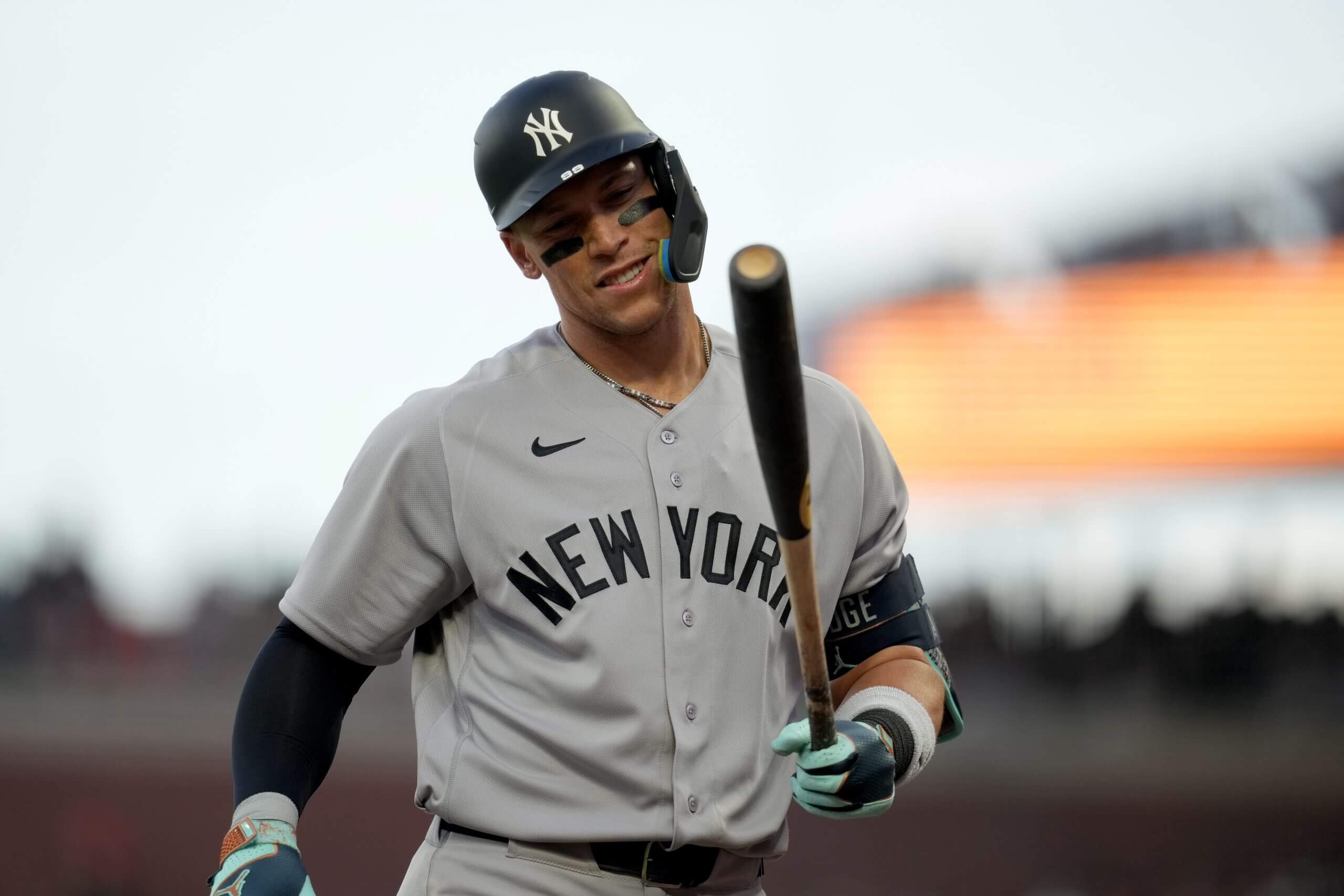 New York Yankees right fielder Aaron Judge (99) looks at his bat between pitches against the San Francisco Giants in the sixth inning at Oracle Park.