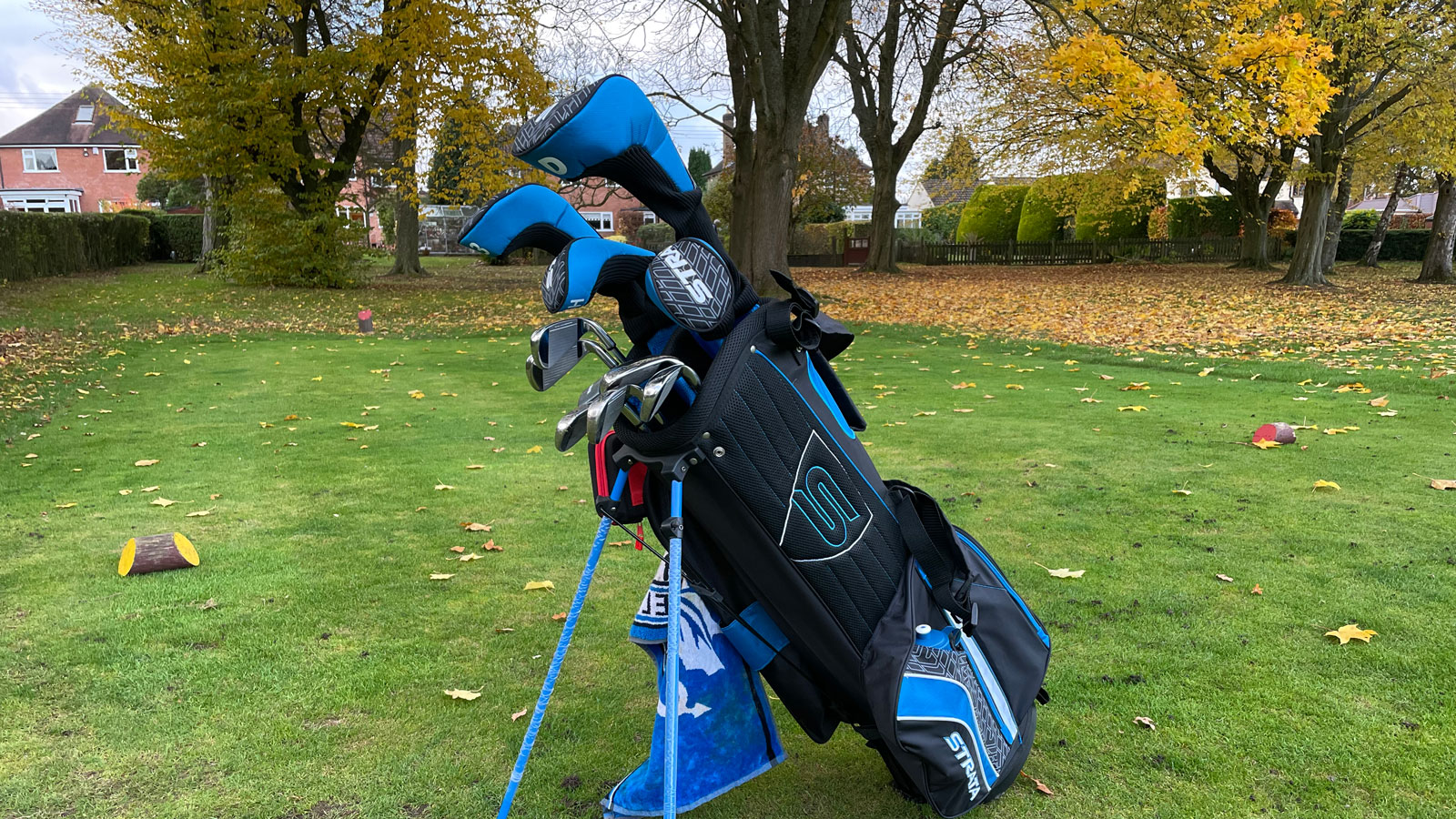 The Strata Men's Package set on a tee box
