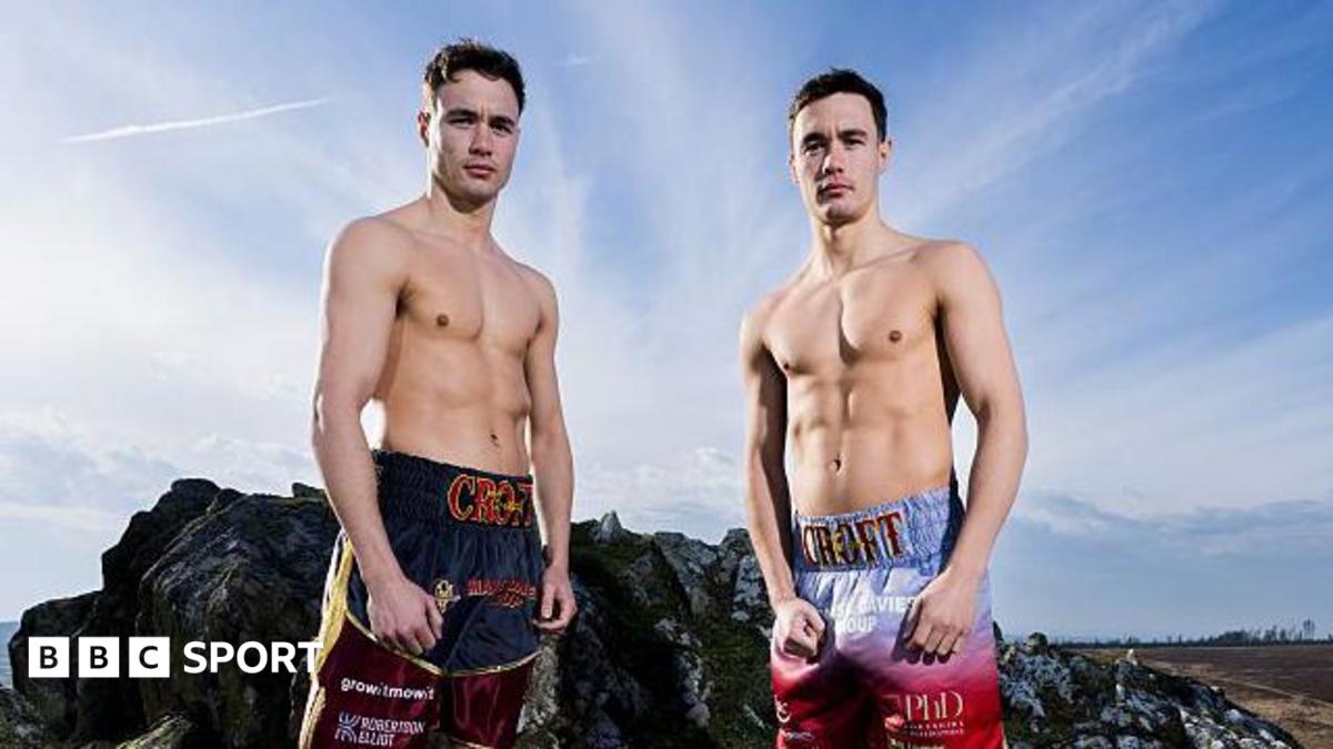 Ioan (left) and Garan Croft pose in boxing shorts on Foel Drygarn hillfort in Pembrokeshire