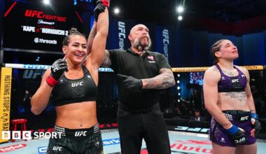 Bia Mesquita of Brazil reacts after a submission victory against Melissa Mullins of England