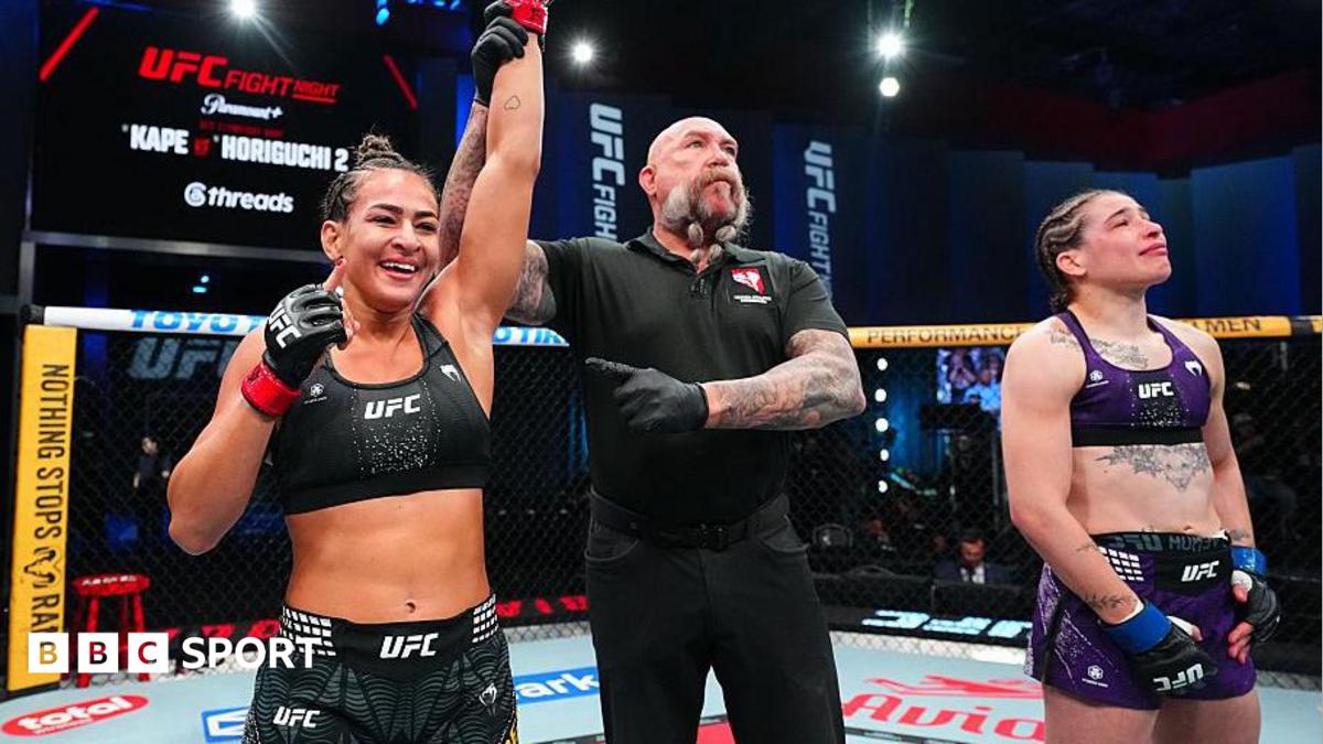 Bia Mesquita of Brazil reacts after a submission victory against Melissa Mullins of England