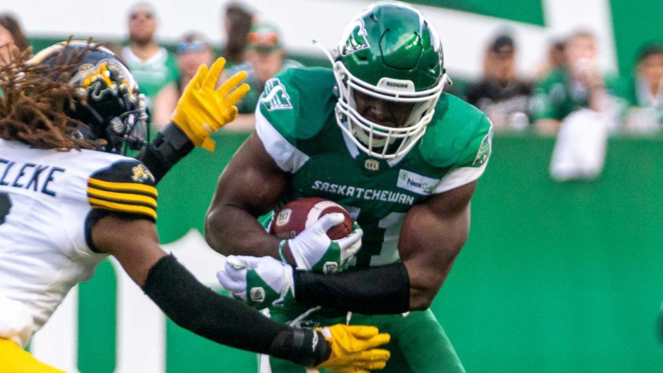 ‘Just one of 12’: Roughriders FB Albert Awachie embraces low-key role on field, school visits off it | 620 CKRM - The Voice of Saskatchewan