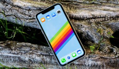 iPhone 11 with rainbow wallpaper