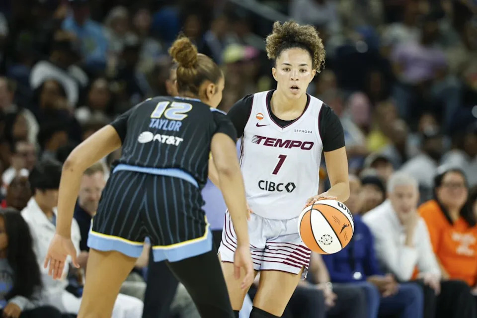 May 27, 2026; Chicago, Illinois, USA; Toronto Tempo guard Kiki Rice (1) brings the ball up court against the Chicago Sky guard Sydney Taylor (12) during the second half at Wintrust Arena. Mandatory Credit: Kamil Krzaczynski-Imagn Images