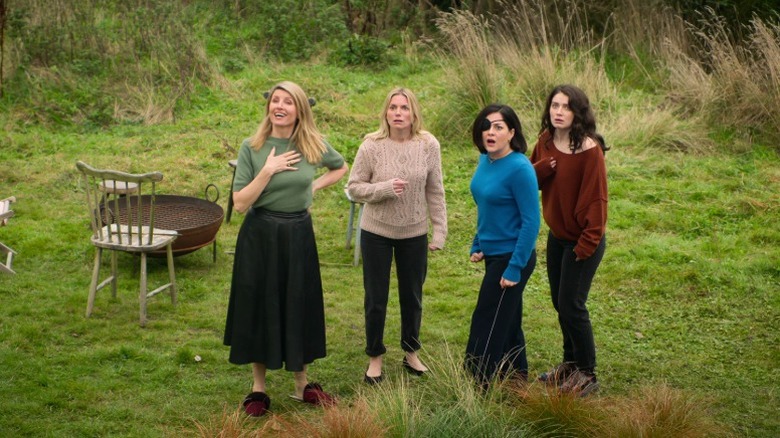 Eva, Ursula, Bibi, and Becka standing on the front yard on Bad Sisters S1E9