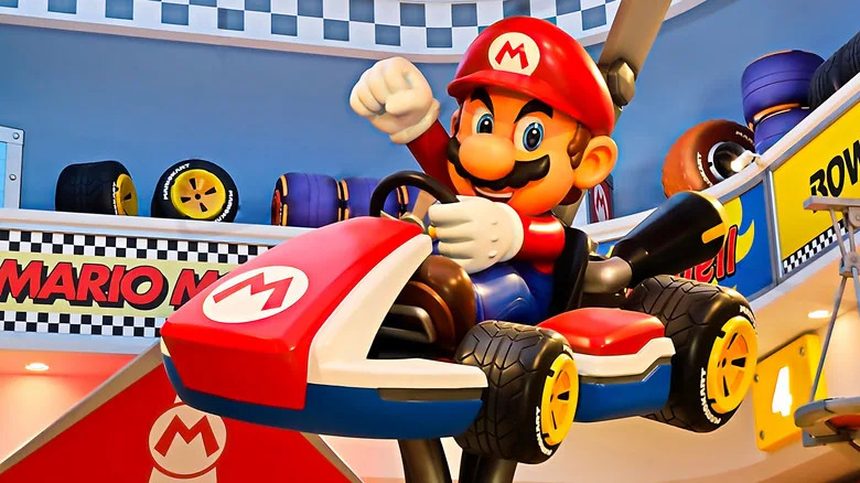 OSAKA, JAPAN - AUG 13, 2025 : Mario and Mario Kart at the goods store at the exit of the attraction Mario Kart in Nintendo World.Super Nintendo World is a themed area at Universal Studios Japan.