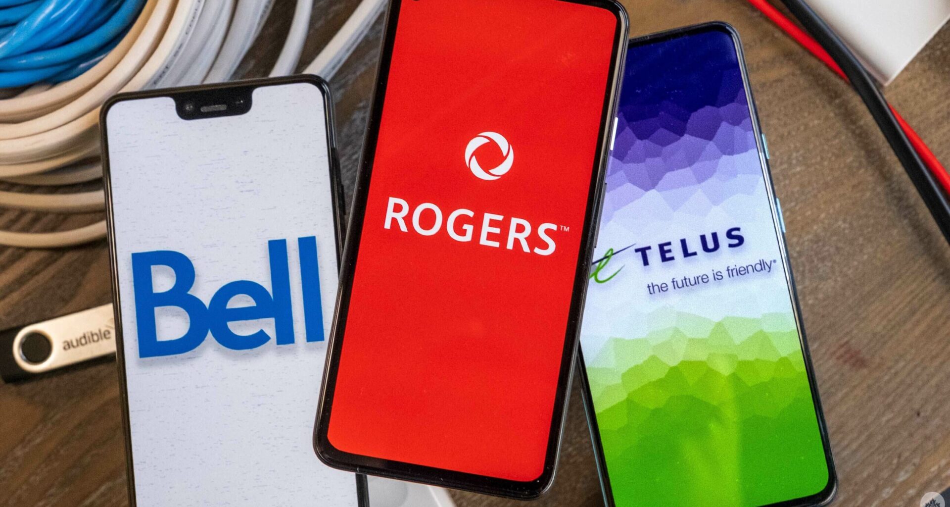 Rogers, Bell, Telus tell CRTC they'll keep charging new fees