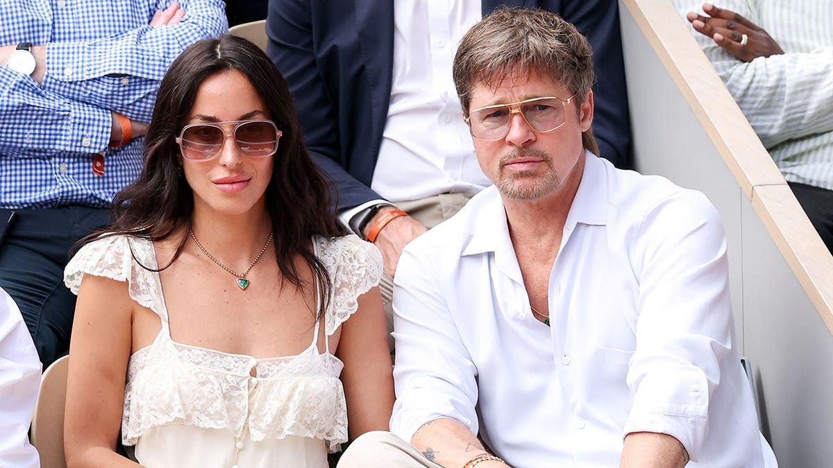 Brad Pitt and Inez de Ramon at the French Open in France in June 2026.